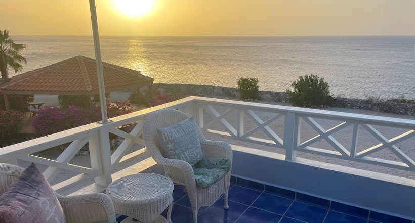 Balcony overlooking sparkling Caribbean Sea