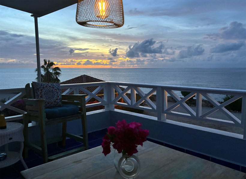 Balcony overlooking sparkling Caribbean Sea