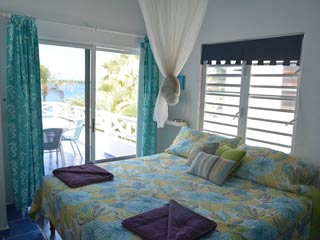 Oceanfront Island Gem - Bedroom with views to the sea